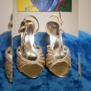 Gold-colored platform sandals